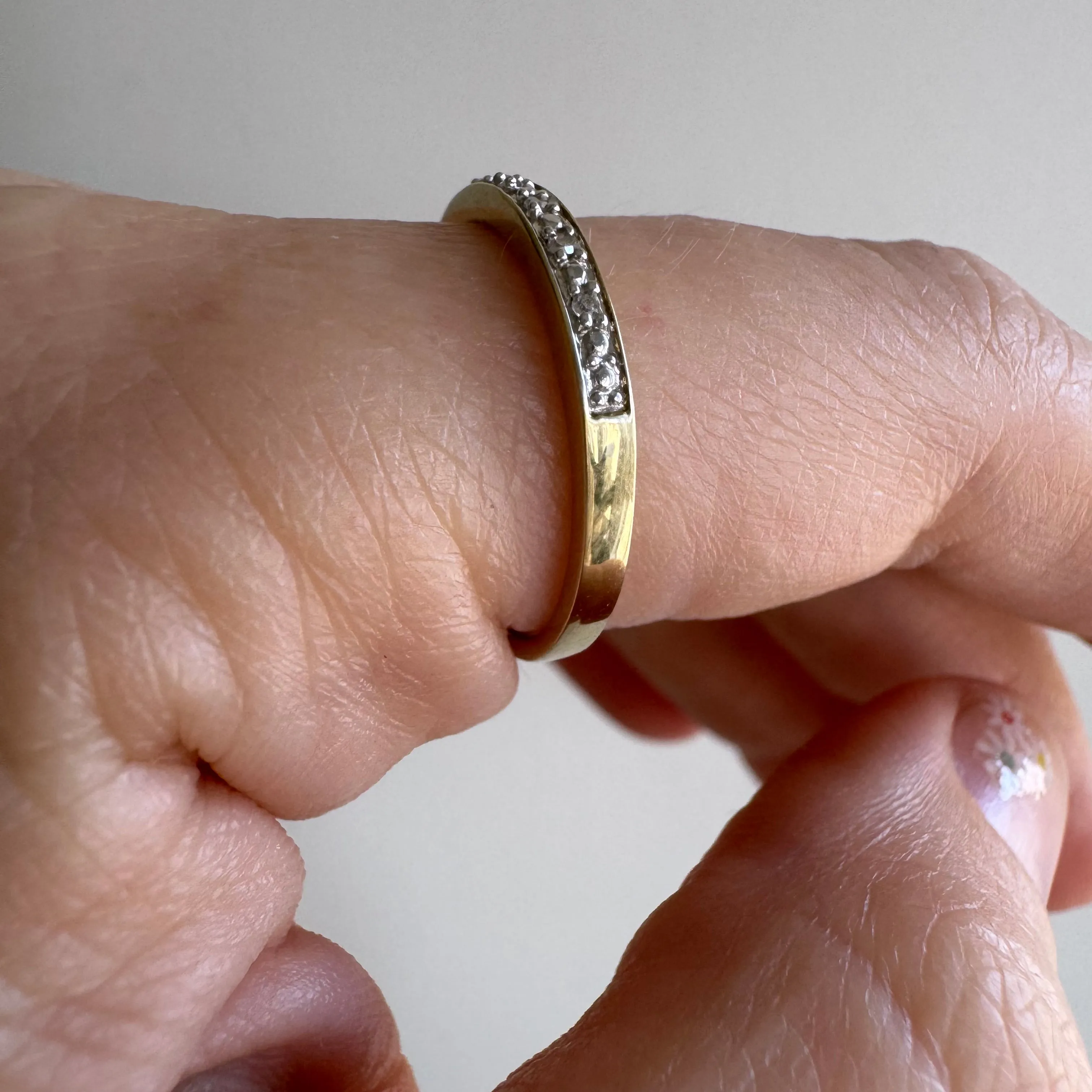 P R E - L O V E D // extra sparkle / 10k yellow and white gold half eternity diamond band / size 7